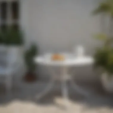 Close-up of a small white patio table adorned with decorative items