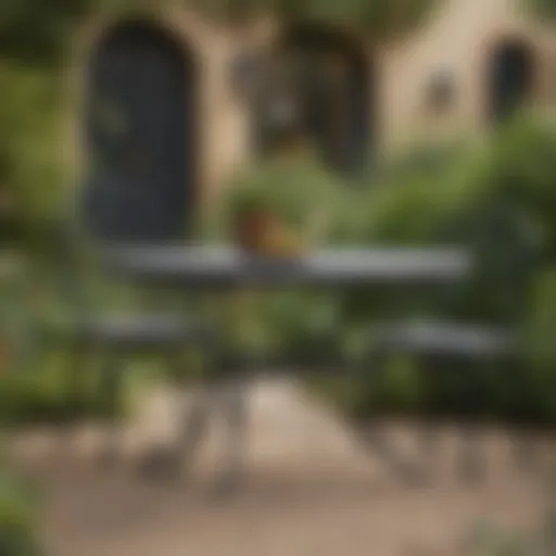 Elegant oval wrought iron patio table set in a lush garden