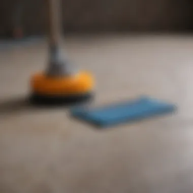 Various cleaning tools laid out for grout cleaning.