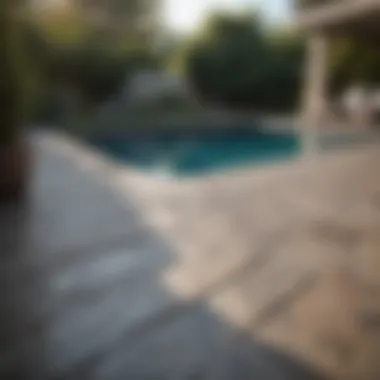 Stone Decking: Timeless Elegance by the Water Sleek stone decking complementing a luxurious pool