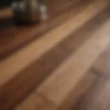 Diverse wood floor color samples displayed on a wooden table