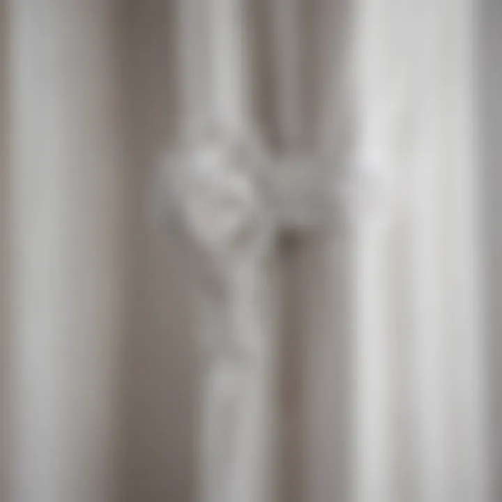 Close-up of a white curtain rod showcasing its intricate design and finish.