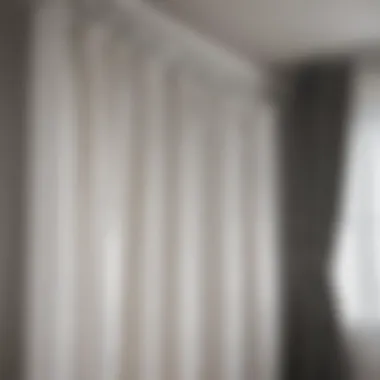 Stylish White Curtain Rod in Eclectic Space Stylish white curtain rod paired with vibrant curtains in an eclectic space.